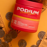 Podium Nutrition bebida mezclada en vaso lista para hidratar
