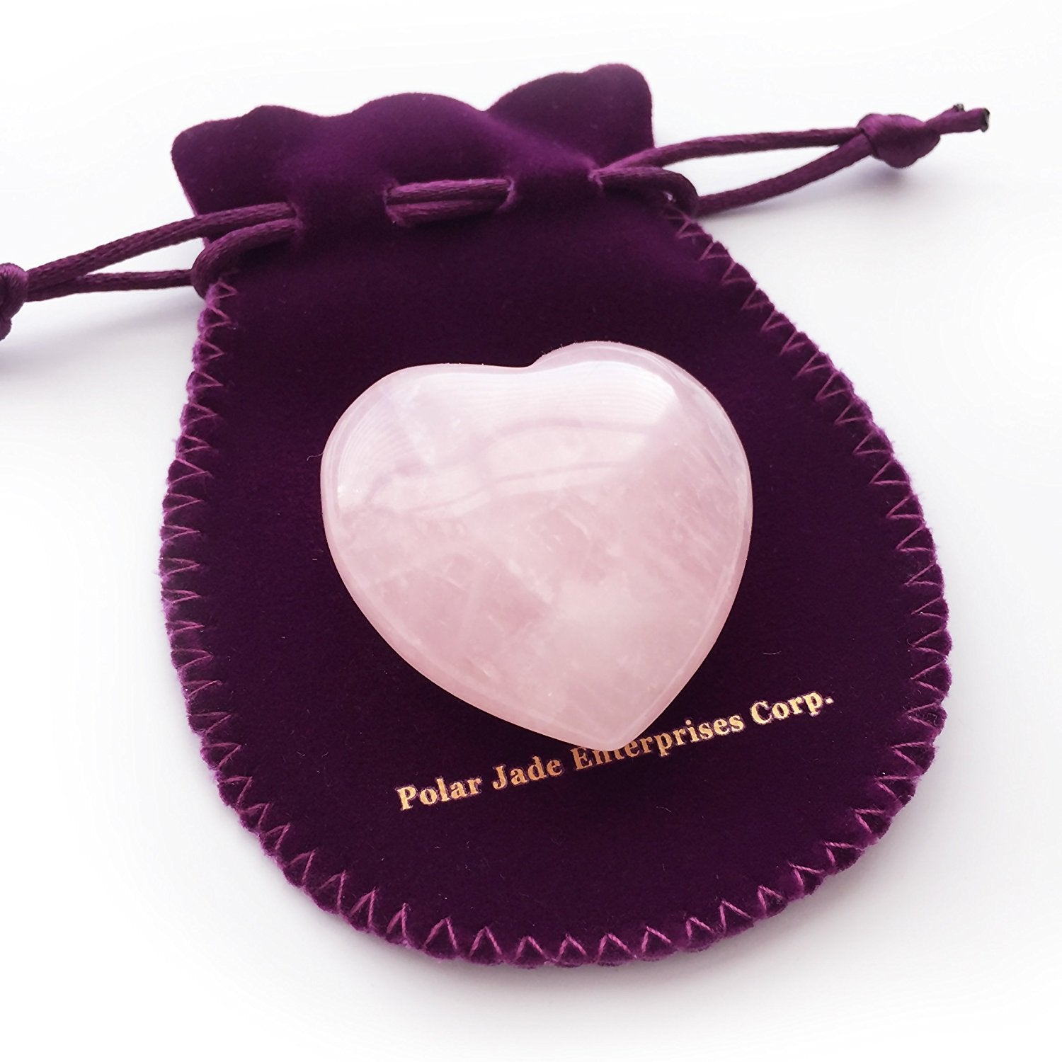 Polar Jade corazón en mano mostrando tamaño cómodo y presencia