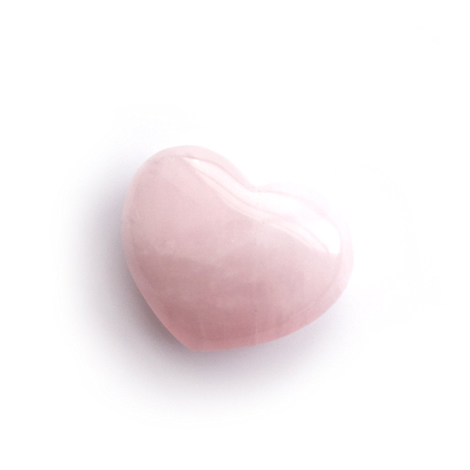 Polar Jade corazón junto a otras piedras ideal para prácticas energéticas