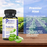 Premier Research Labs cápsula abierta con polvo de aloe visible para confianza