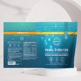Primal Harvest atleta en gimnasio usando sobre para recuperar electrolitos