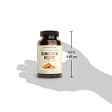Primal Health Foods cápsula junto a moneda para comparar tamaño y dosificación