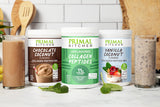 Primal Kitchen envase 20 oz junto a cuchara para comparar tamaño y porciones
