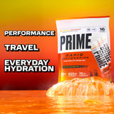 PRIME HYDRATION vaso con bebida Glacier Orange mezclada y lista para hidratar