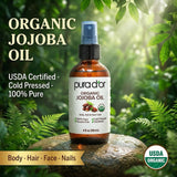 PURA D'OR gota de aceite de jojoba demostrando textura ligera