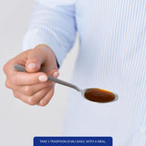 Pure Encapsulations frasco en mano para comparar tamaño y volumen