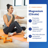 Pure Encapsulations cápsulas en mano para mostrar tamaño y escala