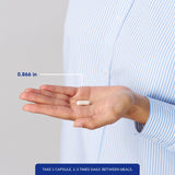 Pure Encapsulations frasco junto a una regla para comparar tamaño y dosis