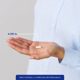 Pure Encapsulations frasco en mano para mostrar escala y facilidad de uso