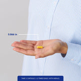 Pure Encapsulations cápsula junto a moneda para referencia de tamaño