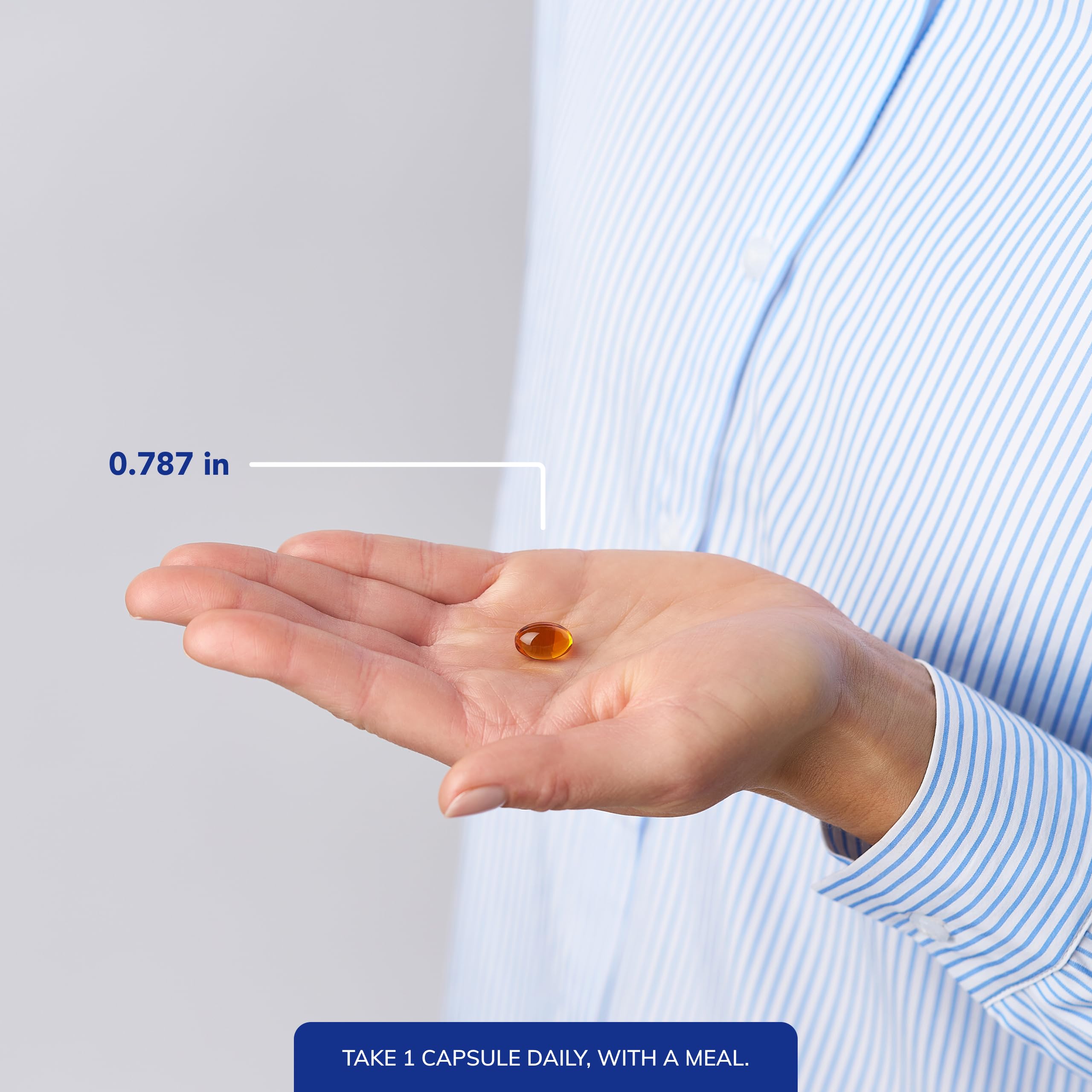 Pure Encapsulations frasco junto a una regla para comparar tamaño y dosis