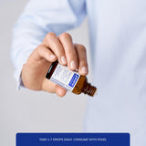 Pure Encapsulations gotas en mano, conveniente para uso diario