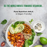 Pure Nutrition Amla en mesa de desayuno integrando suplemento en rutina diaria