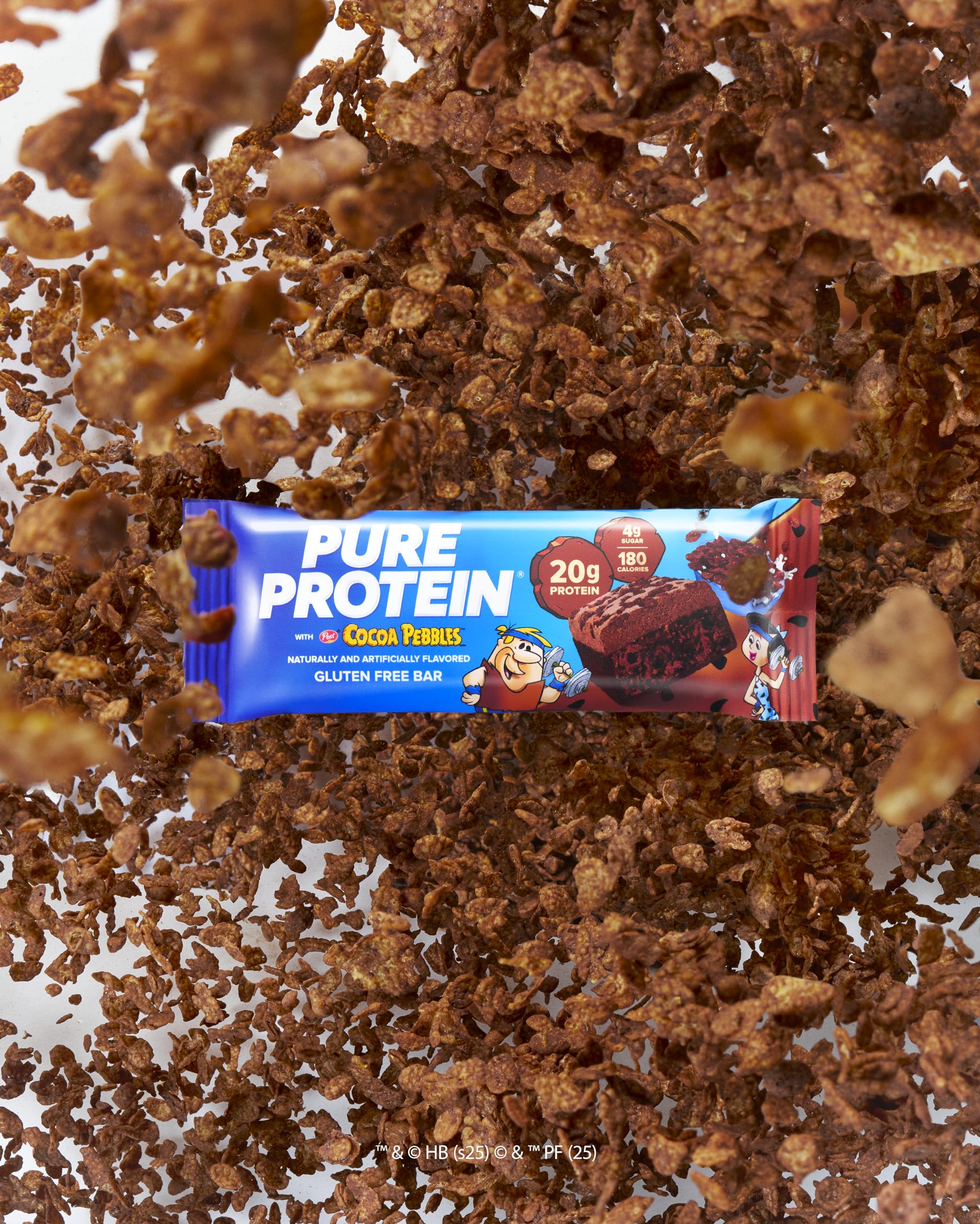 Pure Protein barra abierta con textura interna cremosa y proteína visible para saciedad