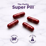 Purity Products estilo de vida saludable persona tomando suplemento