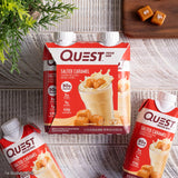 Quest botella junto a mano para comparar tamaño y porción real
