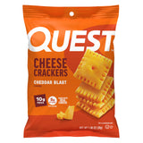 Quest caja frontal mostrando 12 paquetes, ideal para snacks portátiles