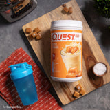 Etiqueta nutricional de Quest mostrando 26 g proteína y 1 g azúcar