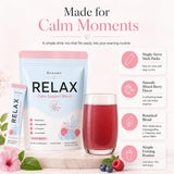 QUIVERA vaso con bebida de frutos rojos listo para beber y sensación de calma