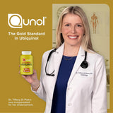 Qunol frasco en cocina junto a alimentos sanos para contexto