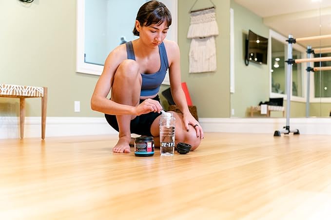 Re-Lyte uso en gimnasio mostrando hidratación práctica y rápida