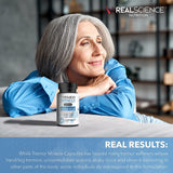 Real Science Nutrition cápsula junto a moneda para comparar tamaño y dosis sencilla