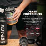 Vaso con bebida Re-Lyte Peach Mango listo para entrenar, Redmond ofrece hidratación sabrosa