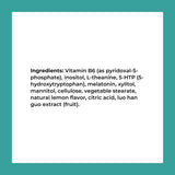 Reignite Wellness frasco en mesita de noche ilustrando uso nocturno práctico