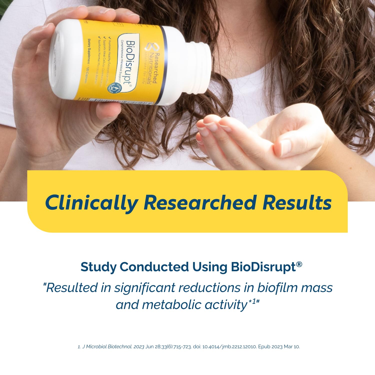 Researched Nutritionals BioDisrupt botella abierta con cápsulas para visualización del contenido