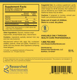 Researched Nutritionals sobre junto a moneda para comparar tamaño y conveniencia