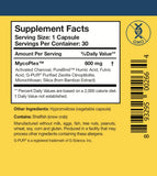 Researched Nutritionals cápsula junto a regla para comparar tamaño y facilidad de ingestión