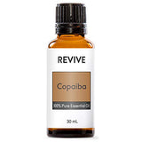 REVIVEEO copaiba botella frontal mostrando etiqueta y uso seguro