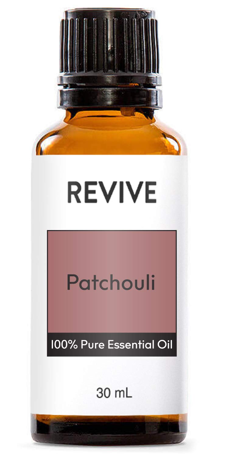REVIVEEO botella frontal mostrando aceite patchouli y calidad premium