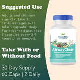 RidgeCrest Herbals AirwayClear cápsula en mano para comparar tamaño
