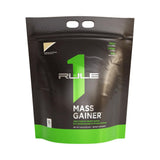 Rule 1 Proteins batido listo en mano mostrando alto aporte calórico para energía