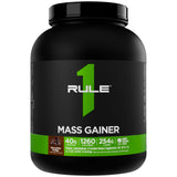 Rule 1 Proteins envase frontal mostrando sabor Chocolate Fudge y diseño limpio