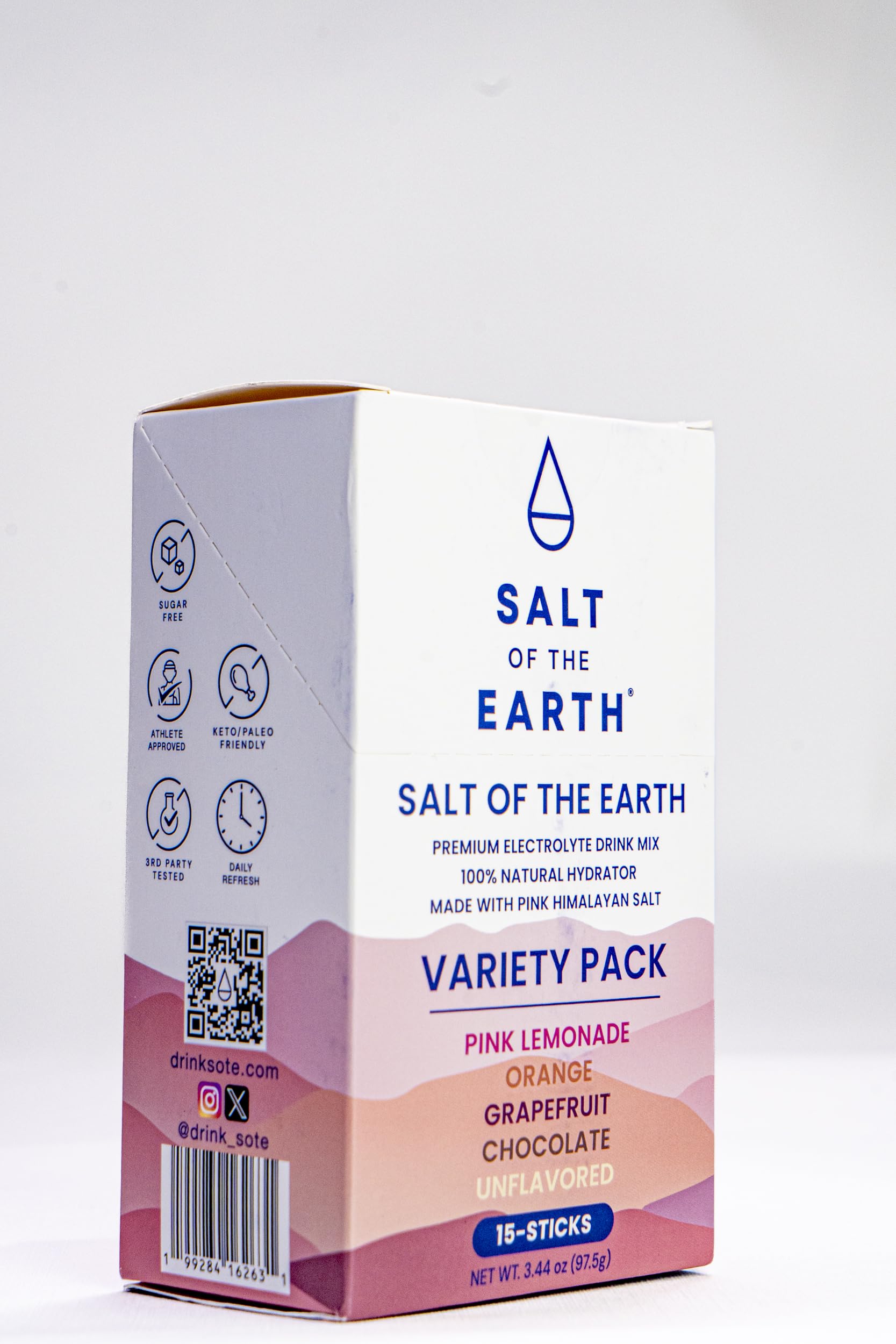 Salt of the Earth sobre individual abierto sobre mano, práctico para llevar