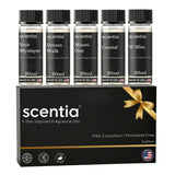 Scentia caja premium abierta mostrando las cinco botellas, elegante y lista para regalo