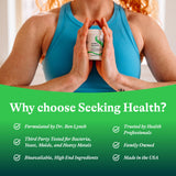 Seeking Health envase abierto con cápsulas visibles y aspecto profesional