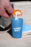 Shake Shot comparado con smartphone para ver tamaño y conveniencia