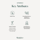 Shaklee Vita-E cápsula junto a una moneda para comparar tamaño práctico