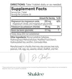 Shaklee VitalMag comparación de tamaño en mano para referencia de dosis