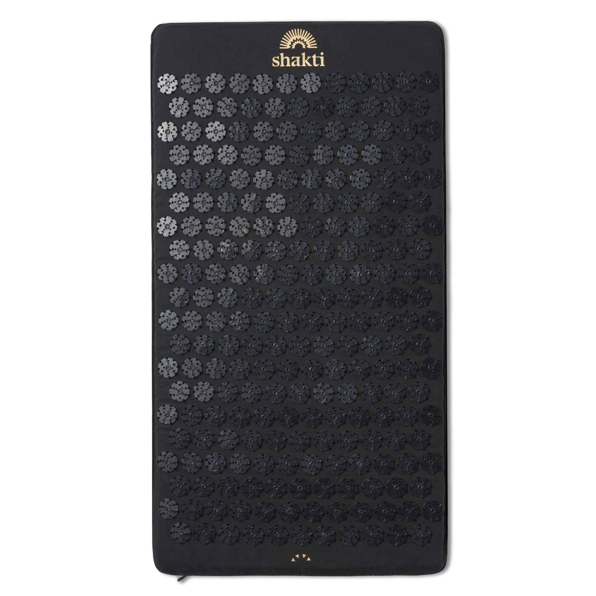 ShaktiMat frontal premium negra mostrando cobertura completa y confort