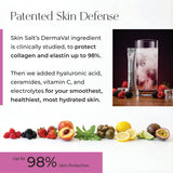 SKIN SALT stick junto a una mano para comparar tamaño y uso portátil