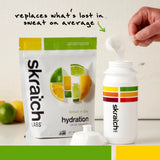 Skratch Labs polvo textura cercana que indica ingredientes de fruta real