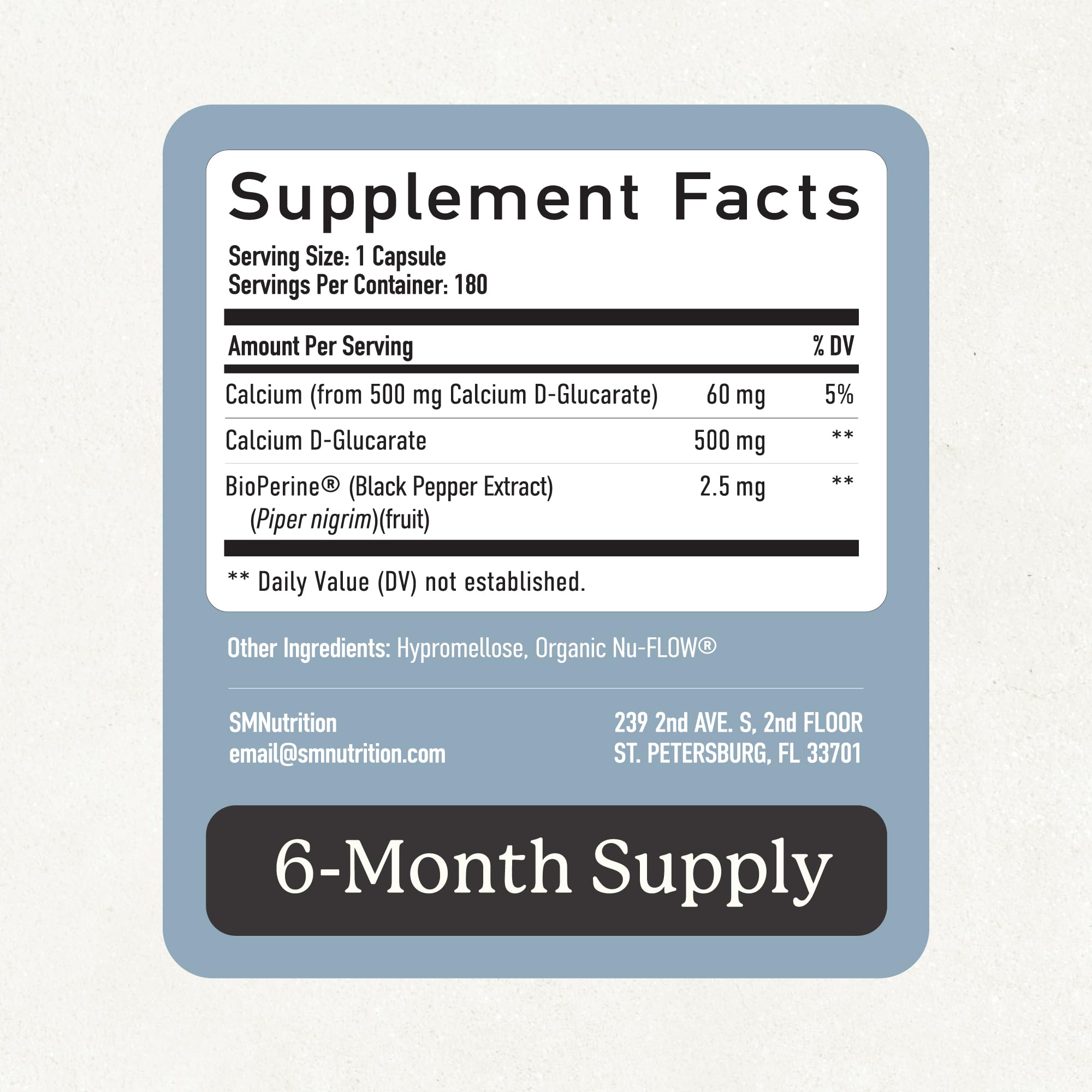 SMNutrition cápsulas sobre superficie natural sugiriendo opción vegana