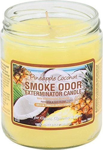 Smoke Odor Exterminator frasco 13 oz mostrando etiqueta y aroma tropical, neutraliza olores