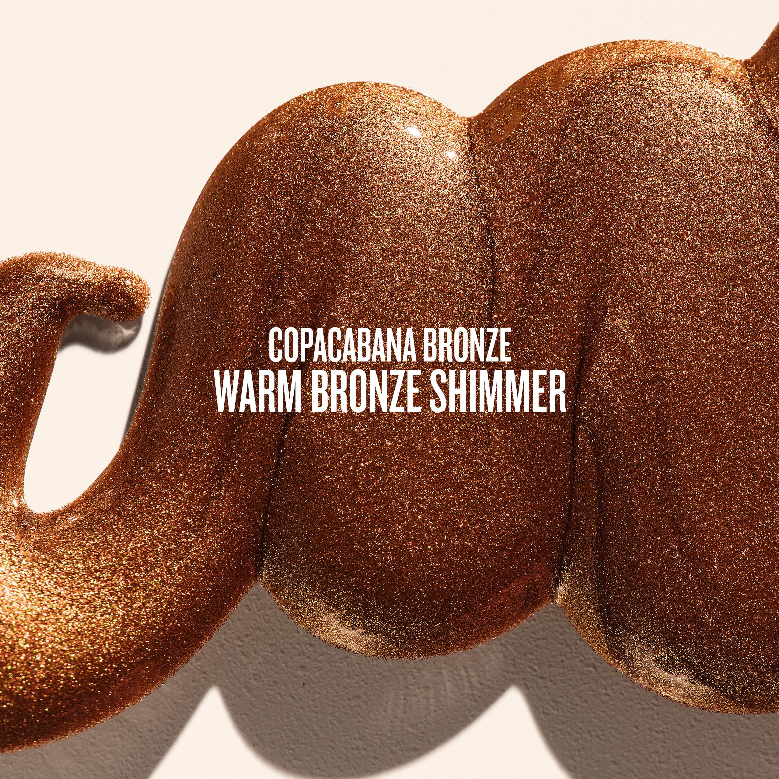 Sol de Janeiro textura en primer plano del aceite bronceador, revela acabado satinado