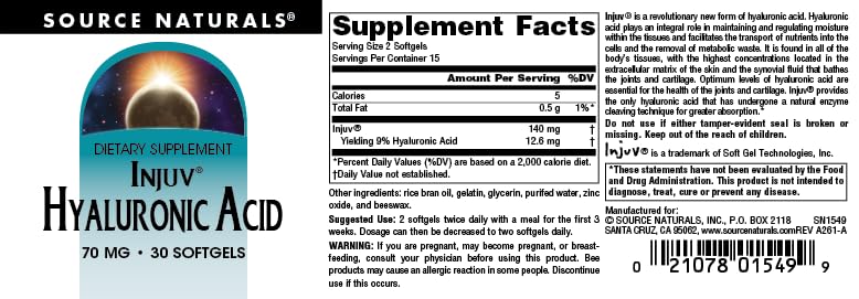 Source Naturals cápsulas en mano para comparar tamaño y dosificación