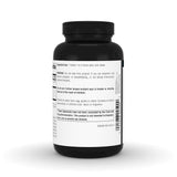 Source Naturals tableta en mano para comparar tamaño y facilidad de toma